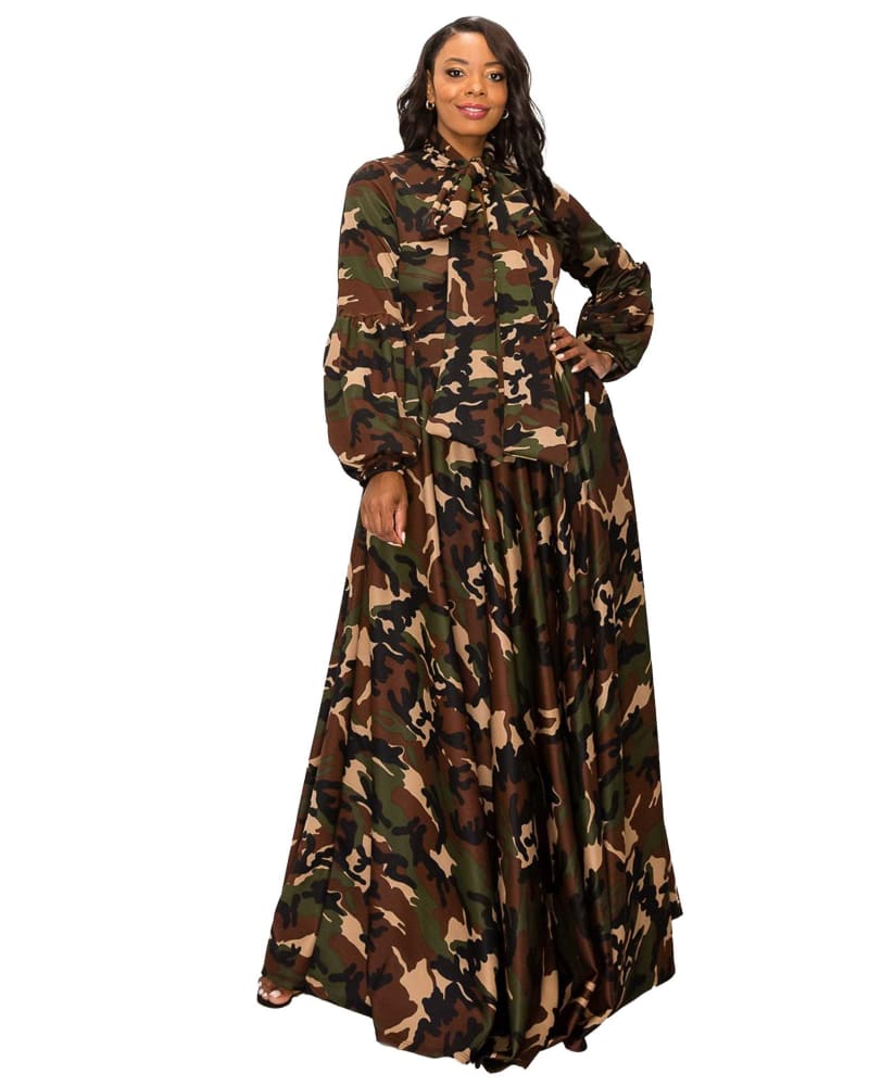 Front of a model wearing a size 14|16 Camo Bella Donna Dress with Ribbon and Puffed Out Sleeves in Camo by L I V D. | dia_product_style_image_id:349088